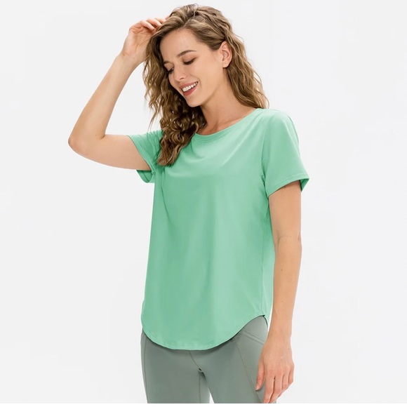 lululemon athletica Tops - Lululemon" Run Around Tee Heathered -Green Mint
